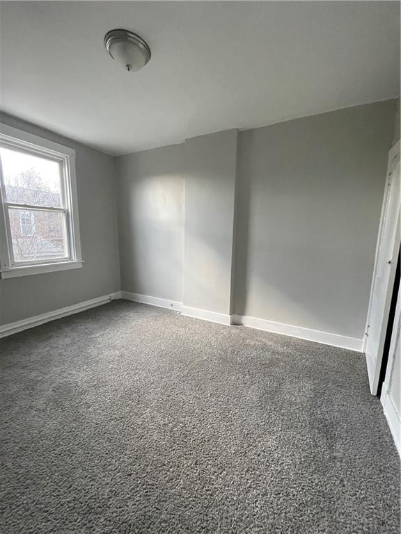 708 Webster Terrace Pittsburgh, PA 15219 - Photo 12 of 22 an empty room with windows