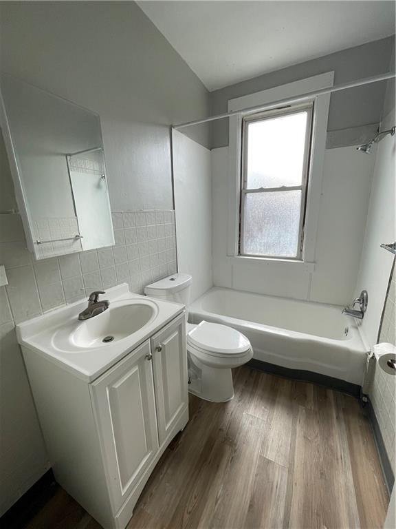 708 Webster Terrace Pittsburgh, PA 15219 - Photo 13 of 22 a bathroom with a sink toilet and tub