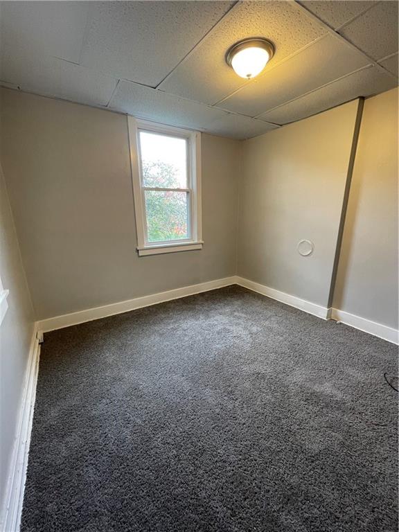 708 Webster Terrace Pittsburgh, PA 15219 - Photo 18 of 22 an empty room with a window