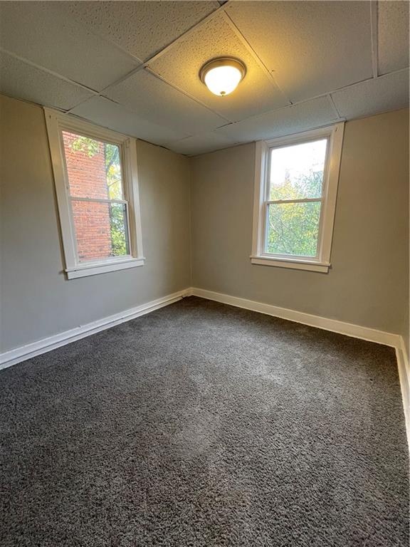 708 Webster Terrace Pittsburgh, PA 15219 - Photo 19 of 22 an empty room with a window