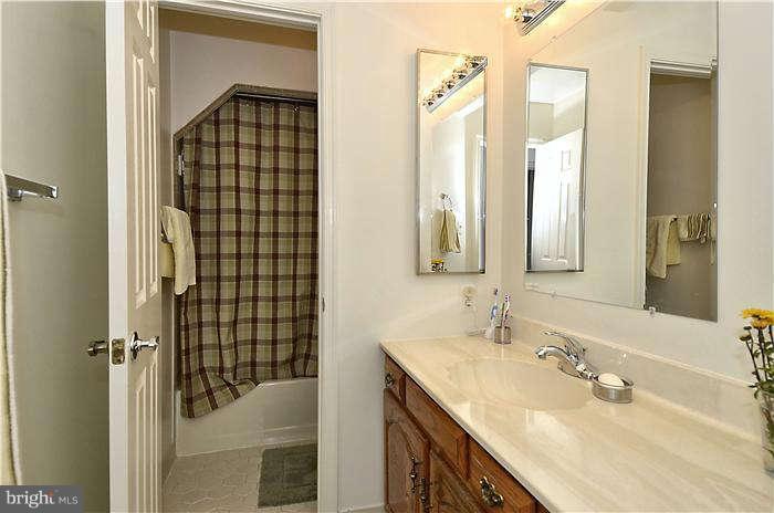 14571 Cutstone Way Silver Spring, MD 20905 - Photo 22 of 30 Full hall bath with separate shower area