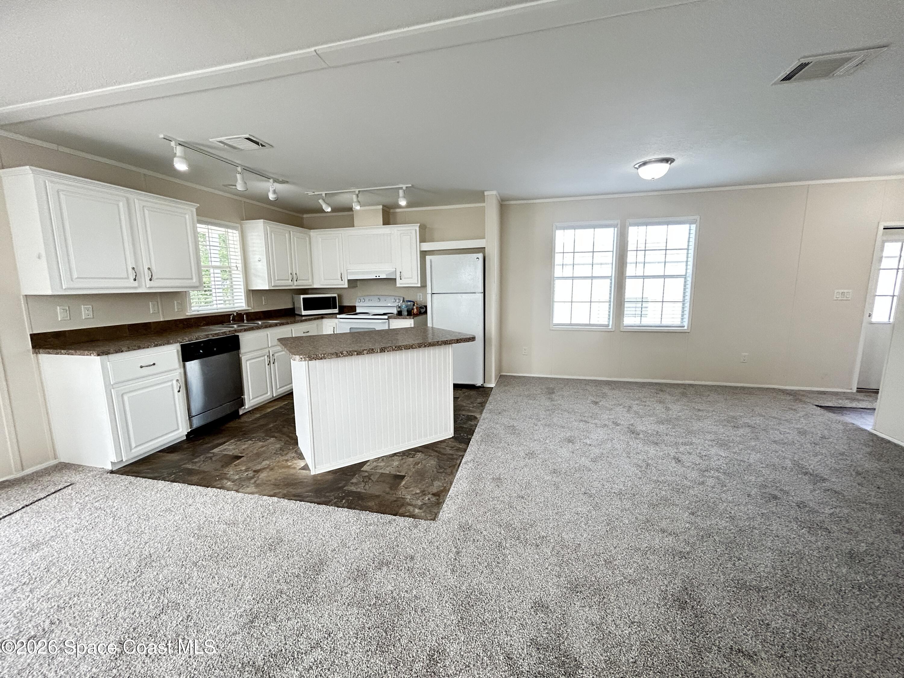 117 Lewis Street Edgewater, FL 32141 - Photo 12 of 26 DinRmKitchen