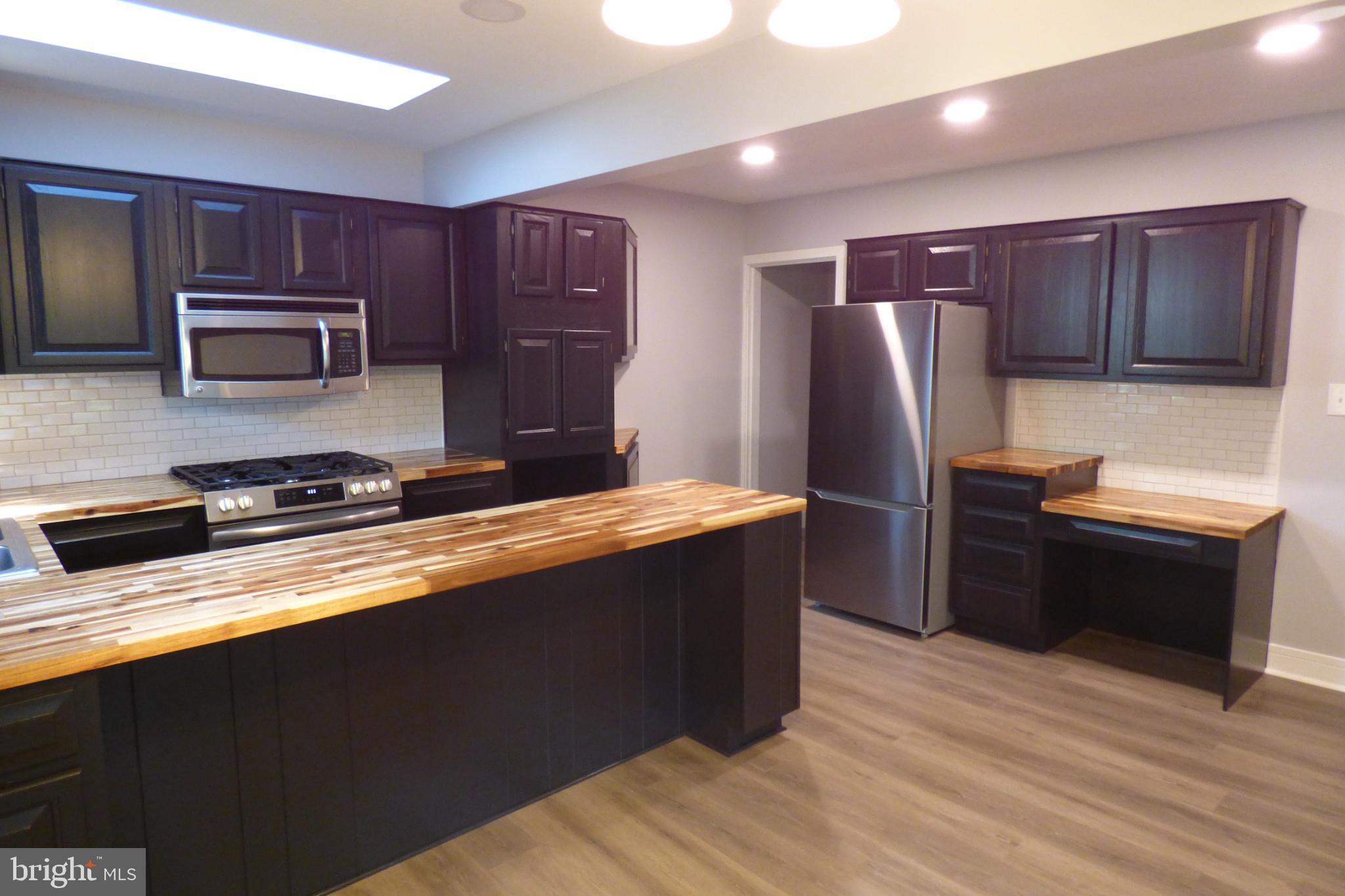 430 Moul Avenue Hanover, PA 17331 - Photo 6 of 30 Modern kitchen with sleek cabinetry and style.