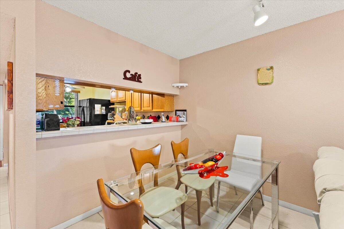9563 West McNab Road, Unit 206 Tamarac, FL 33321 - Photo 4 of 20 dining