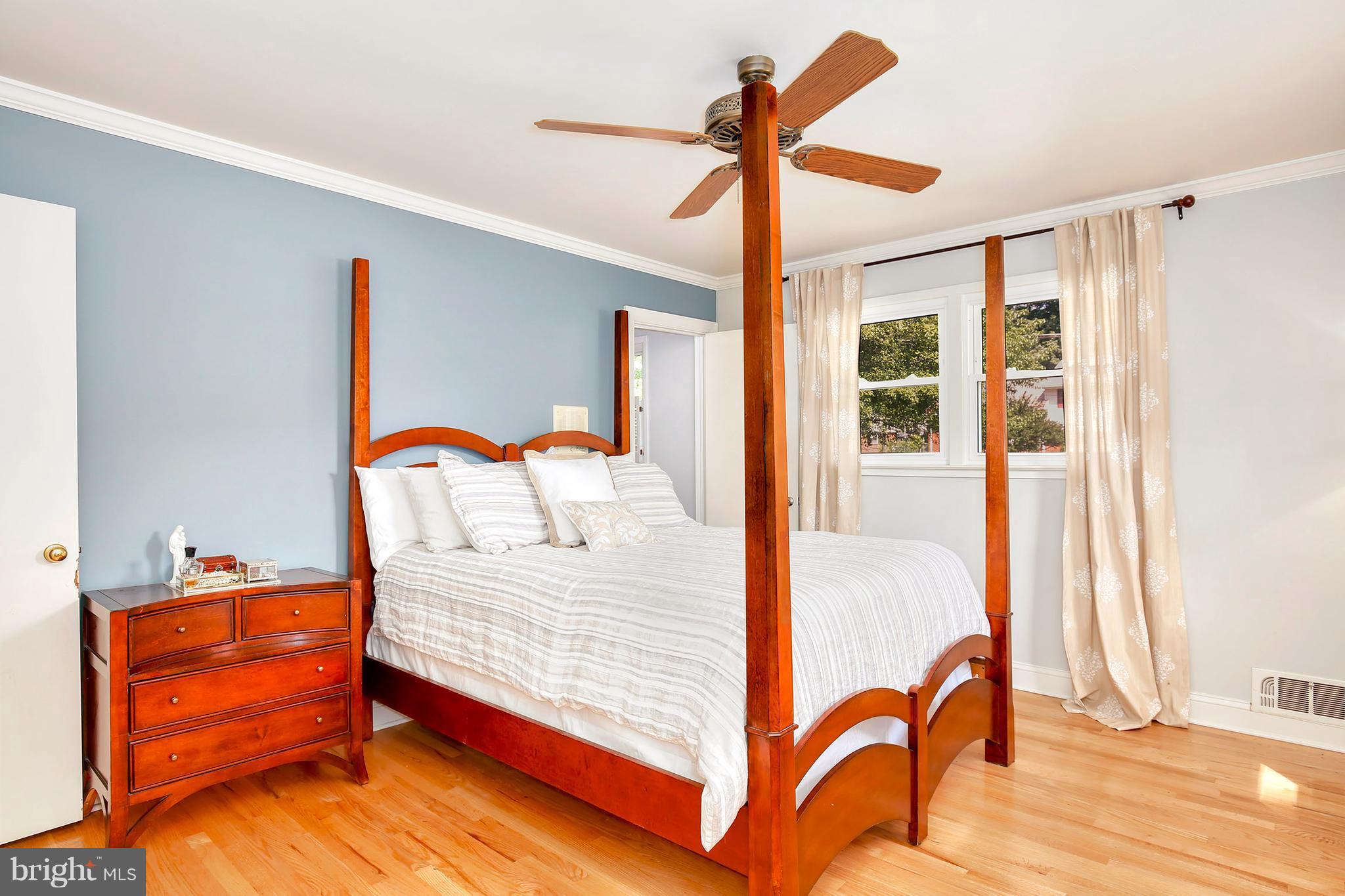5304 Ravensworth Road Springfield, VA 22151 - Photo 15 of 30 a bedroom with a bed and a window