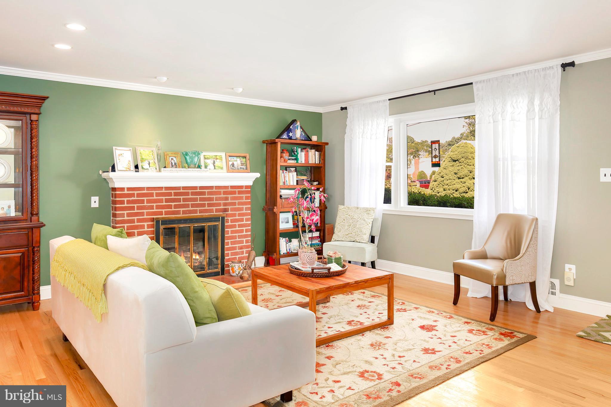 5304 Ravensworth Road Springfield, VA 22151 - Photo 3 of 30 a living room with furniture fireplace and window