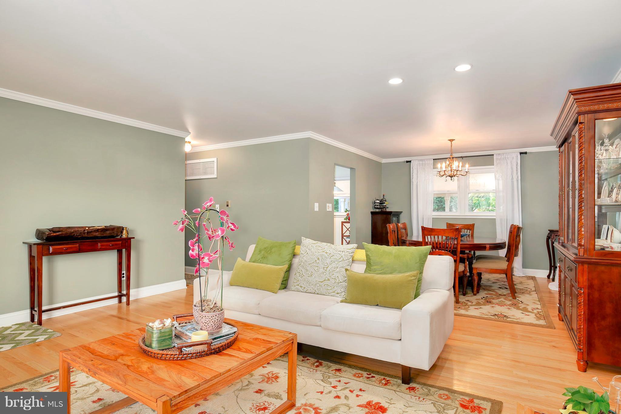 5304 Ravensworth Road Springfield, VA 22151 - Photo 5 of 30 a living room with furniture and wooden floor