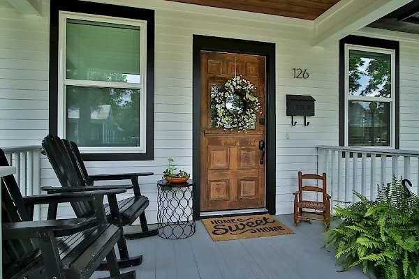 a front view of a house with a yard