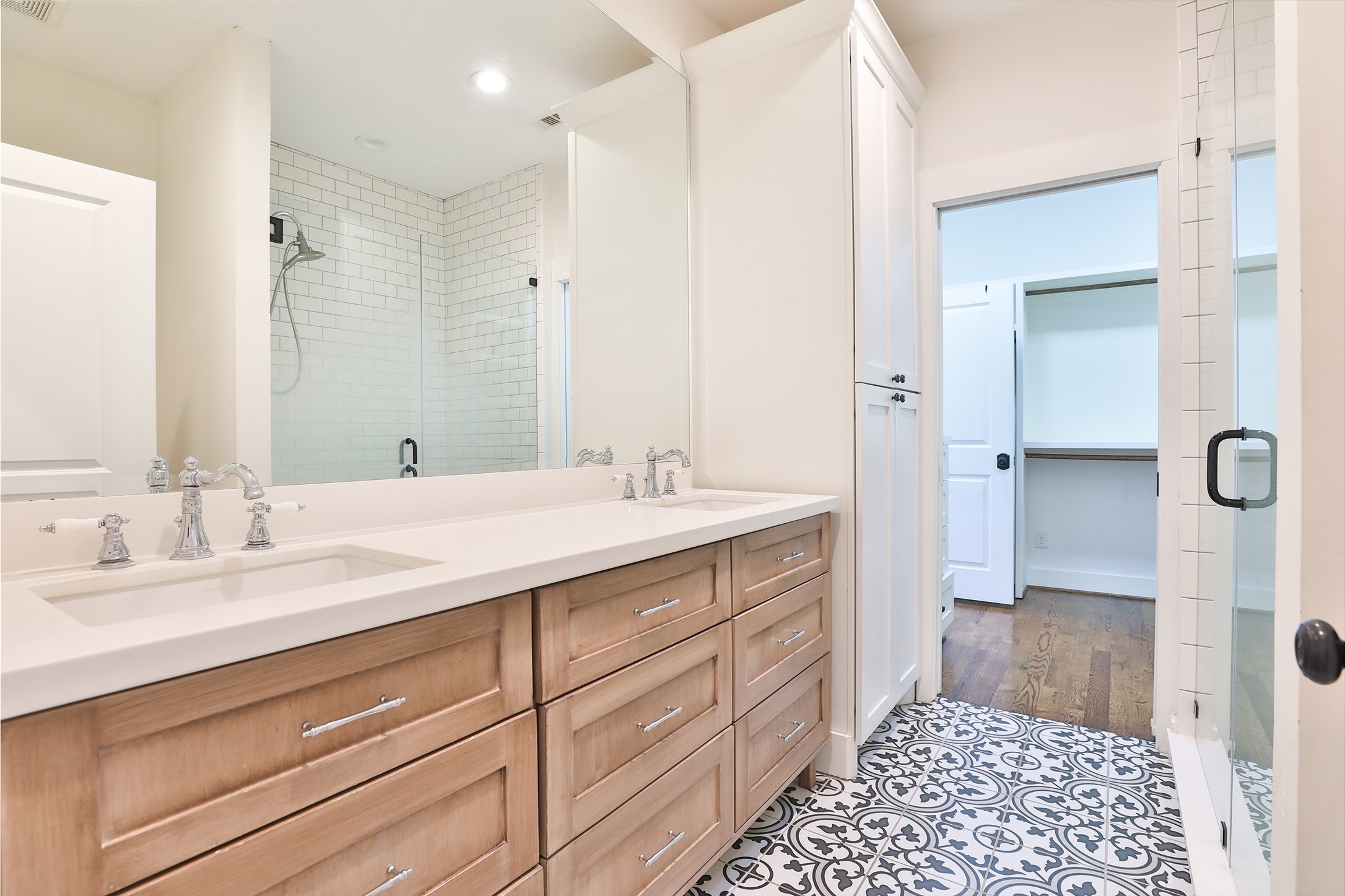 126 2nd Street Sugar Land, TX 77498 - Photo 31 of 50 a bathroom with a sink a vanity and a mirror