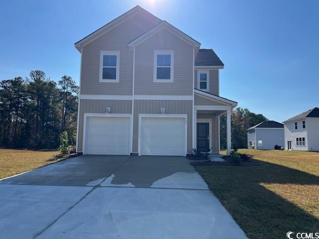 753 Sturdy Root Place Myrtle Beach, SC 29588 - Photo 1 of 19 View of front of property featuring a front yard, concrete driveway, and a garage
