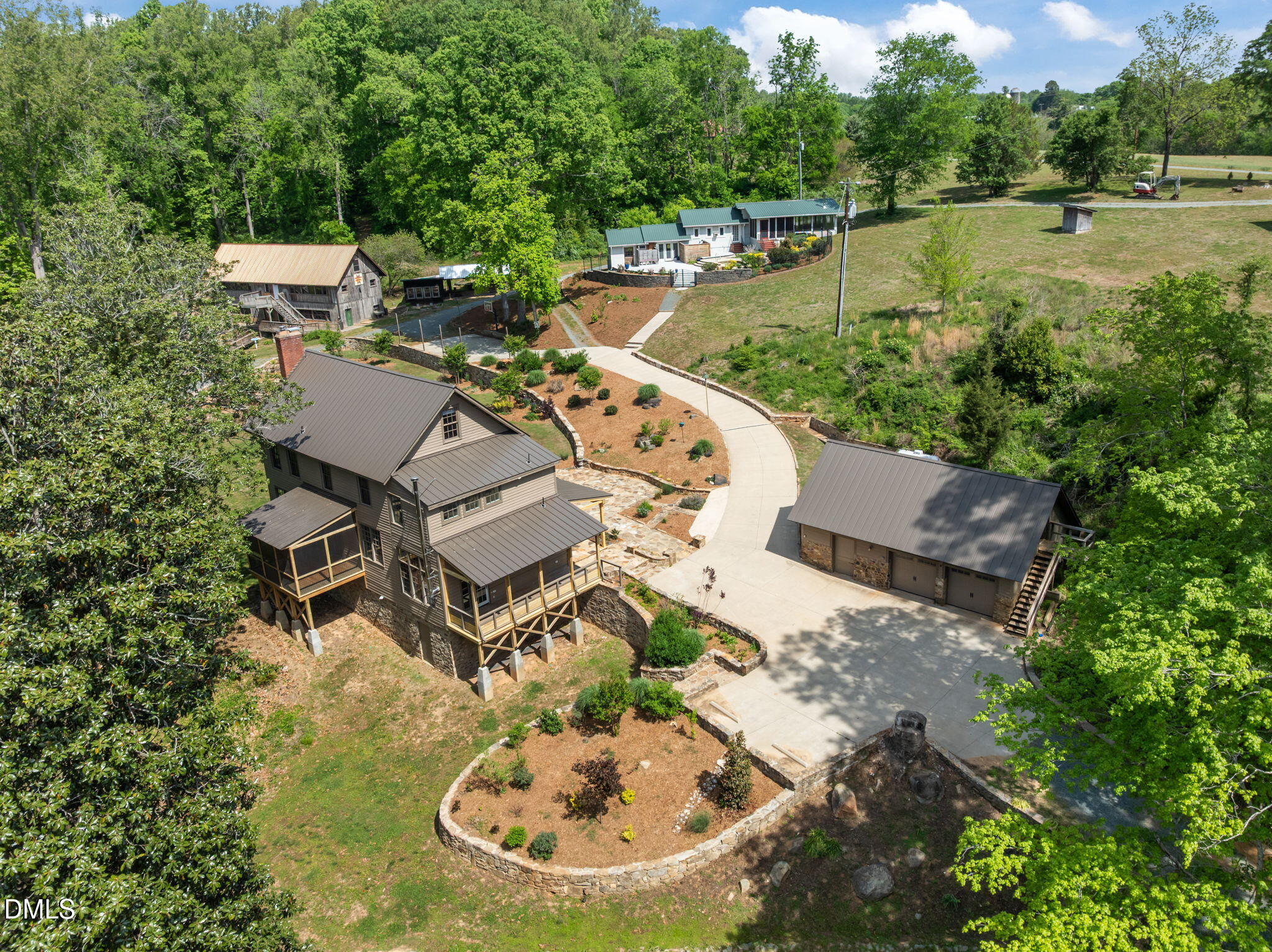 7923 Morrow Mill Road Chapel Hill, NC 27516 - Photo 1 of 66 an aerial view of a house with outdoor space swimming pool and lake view