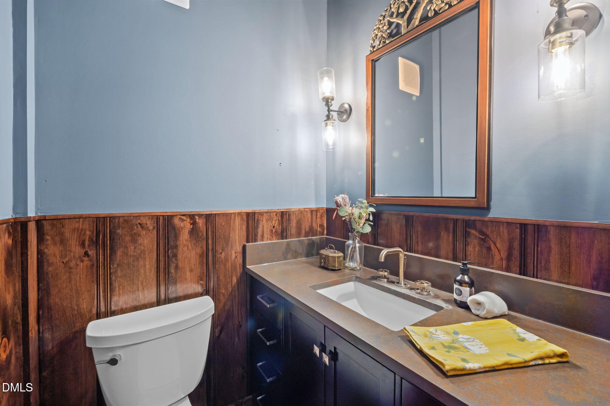 7923 Morrow Mill Road Chapel Hill, NC 27516 - Photo 26 of 66 a bathroom with a granite countertop sink toilet and mirror