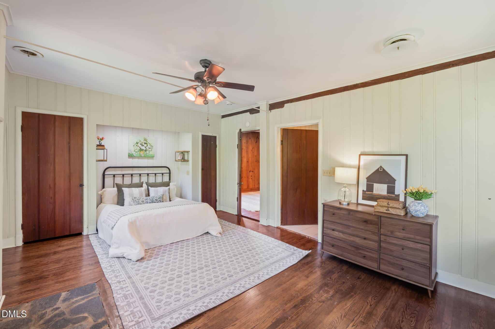 7923 Morrow Mill Road Chapel Hill, NC 27516 - Photo 33 of 66 a bedroom with a bed and a dresser