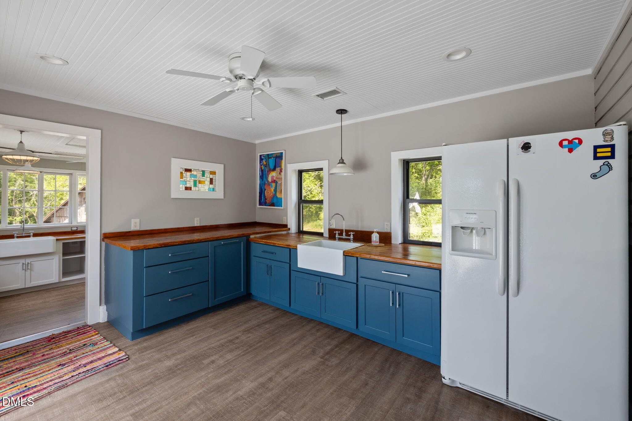 7923 Morrow Mill Road Chapel Hill, NC 27516 - Photo 45 of 66 a kitchen with stainless steel appliances a refrigerator and a stove top oven