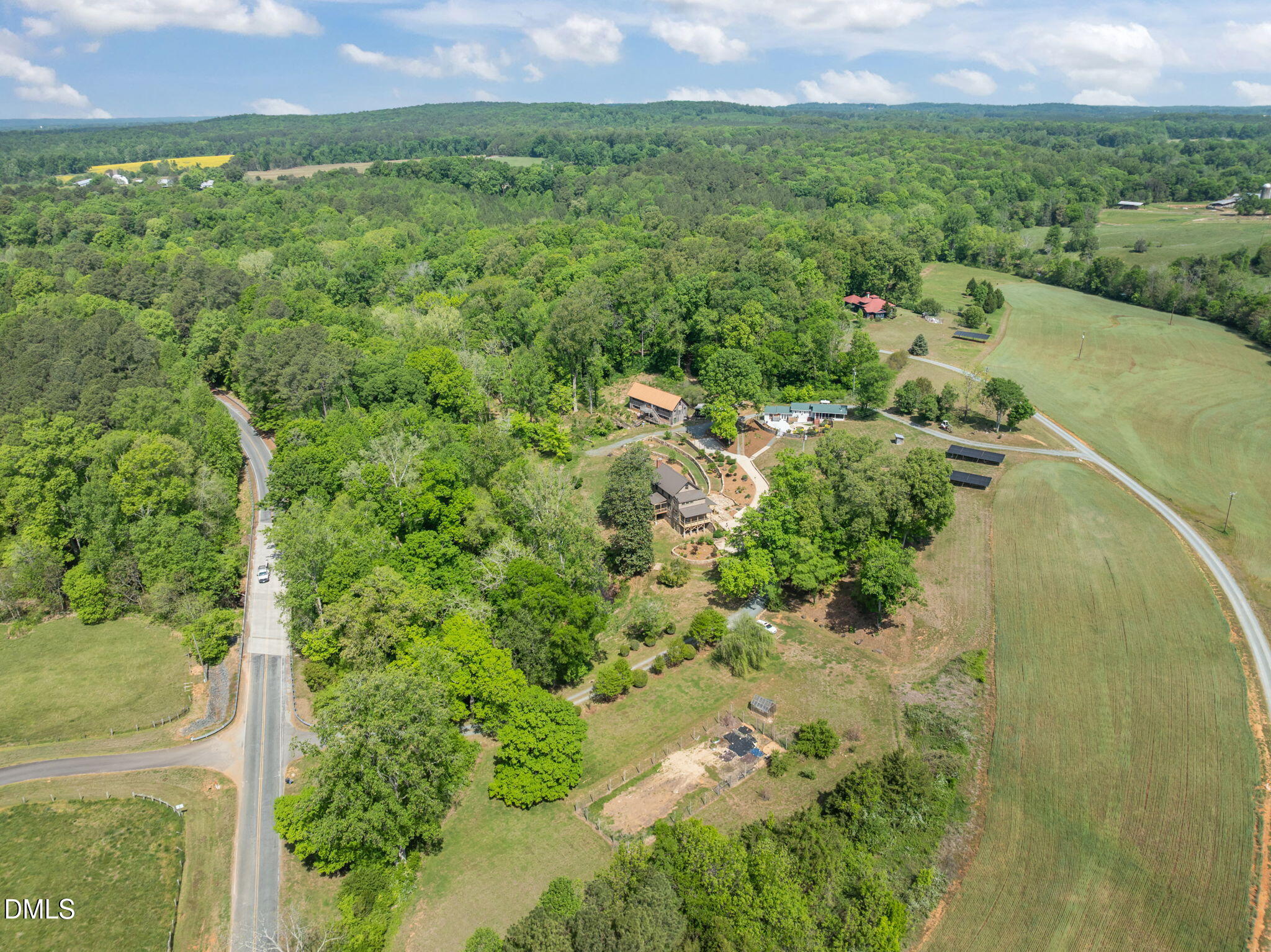 7923 Morrow Mill Road Chapel Hill, NC 27516 - Photo 60 of 66 a view of a lush green field