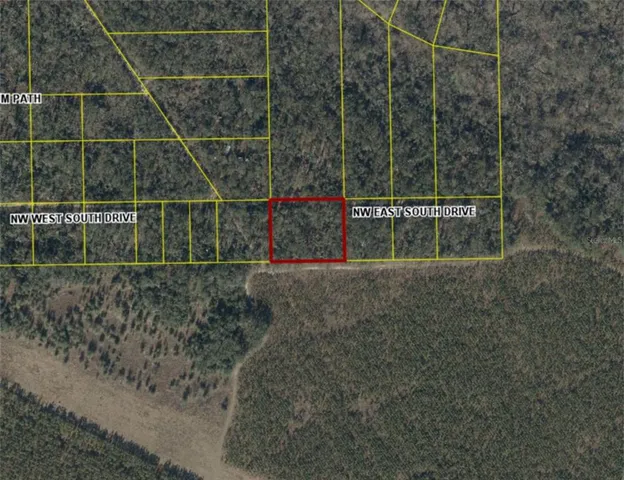 a sign broad on the side of a road