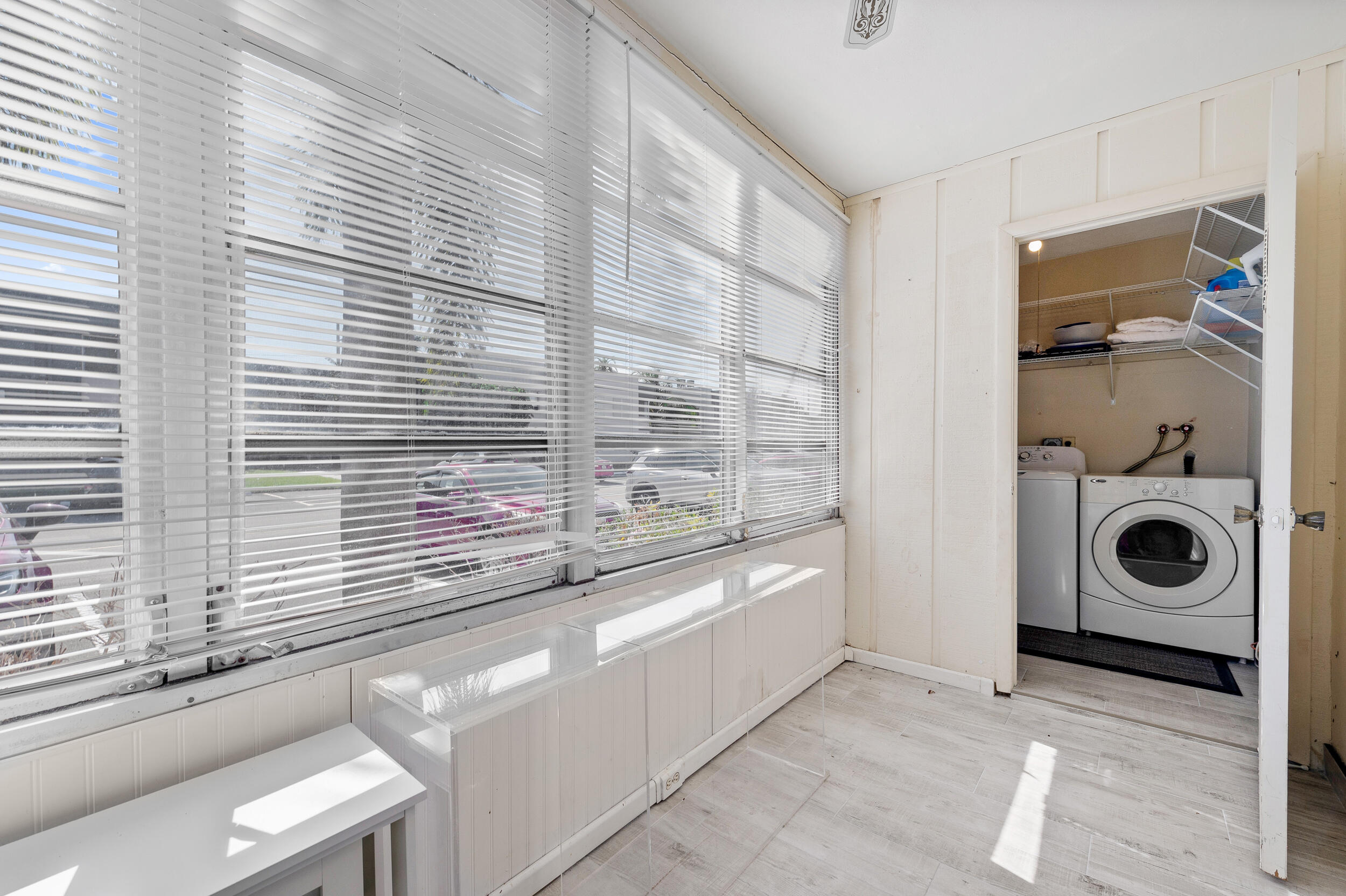 488 Burgundy P Delray Beach, FL 33484 - Photo 18 of 33 a bathroom with a bathtub and a window