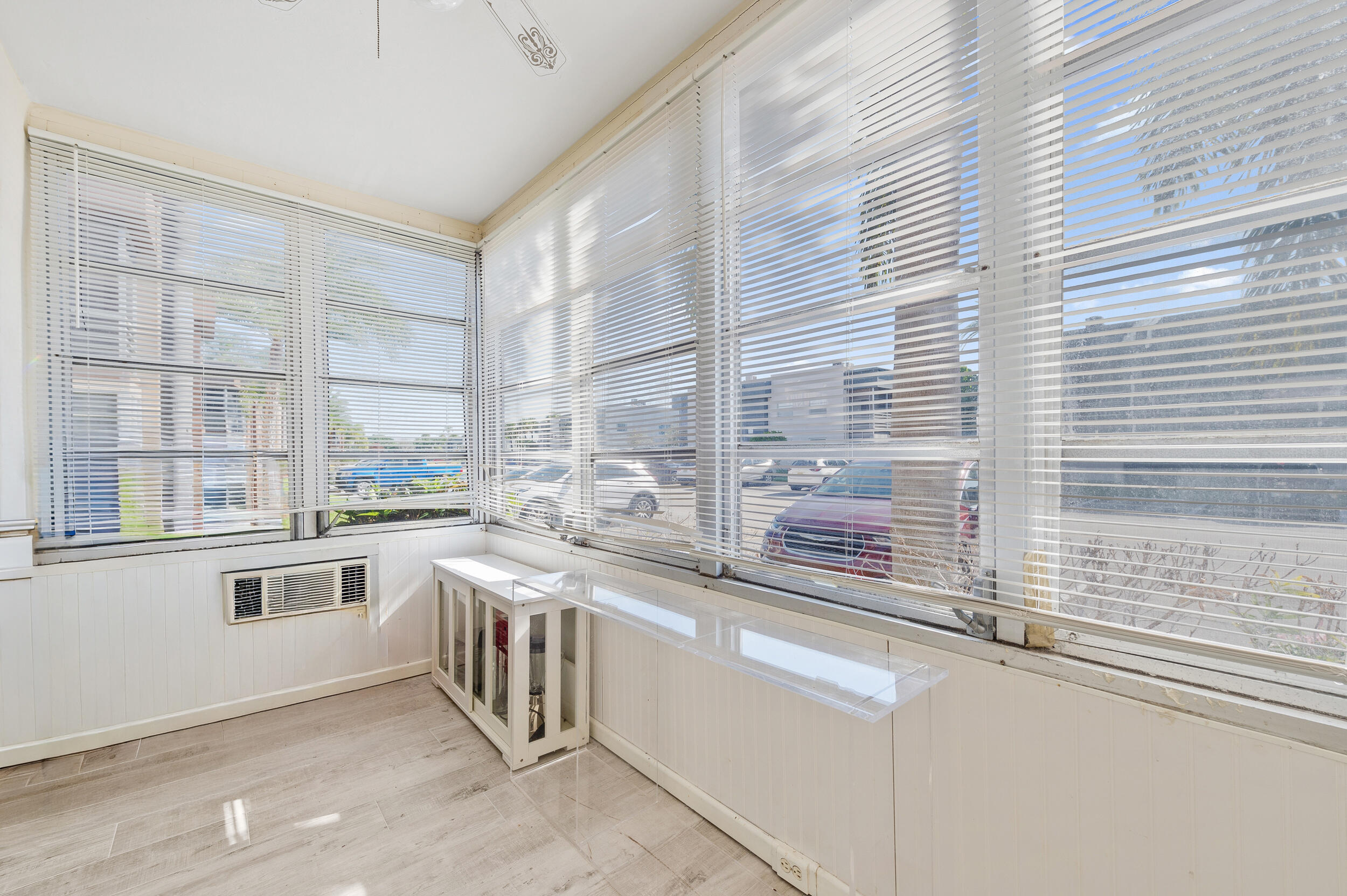 488 Burgundy P Delray Beach, FL 33484 - Photo 19 of 33 a large white kitchen with a sink and cabinets