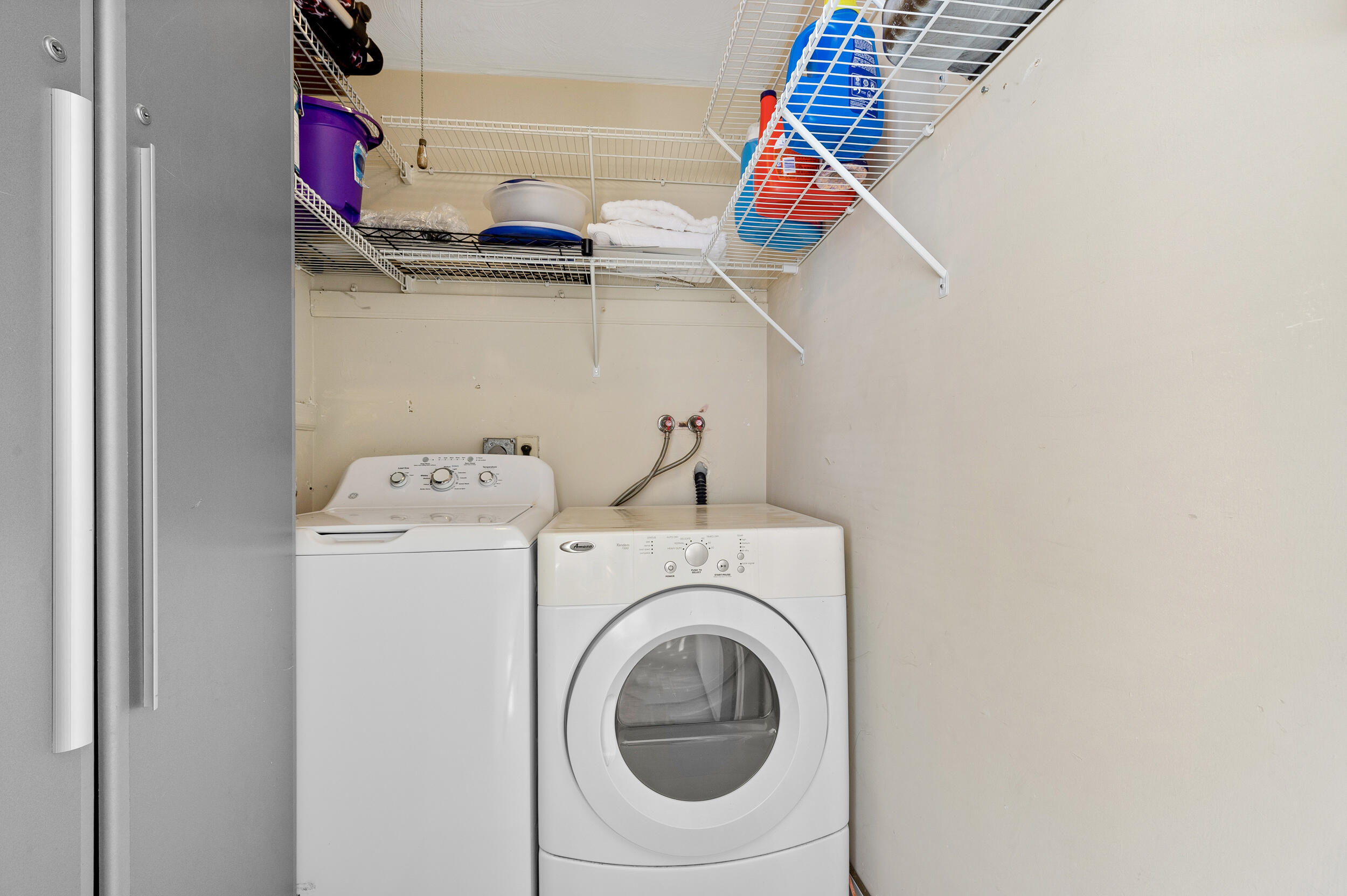 488 Burgundy P Delray Beach, FL 33484 - Photo 20 of 33 a utility room with dryer and washer