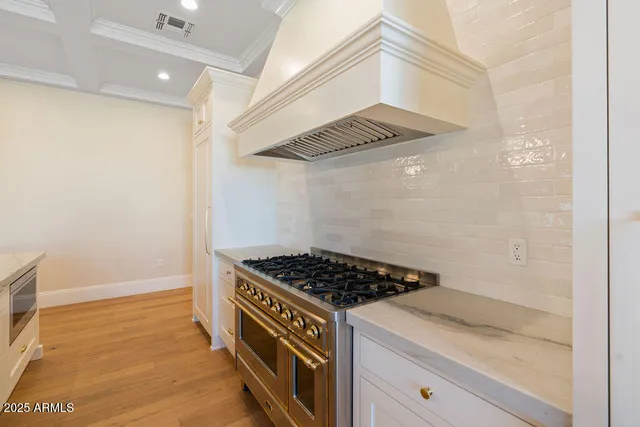a spacious bathroom with a bathtub and shower