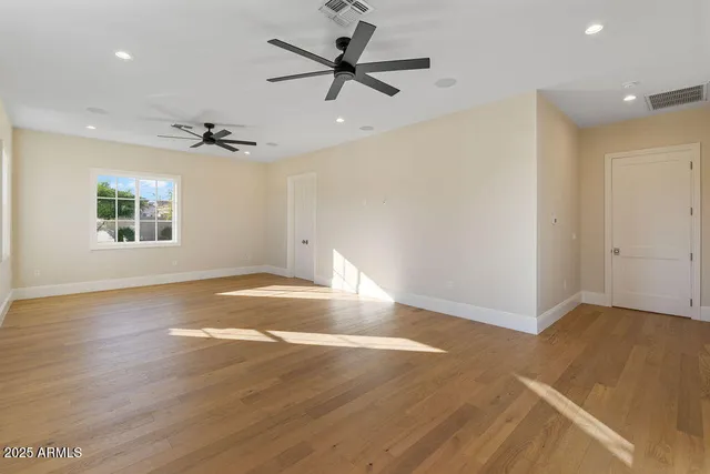 a bathroom with a granite countertop shower