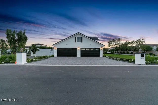 an aerial view of a house with a garden