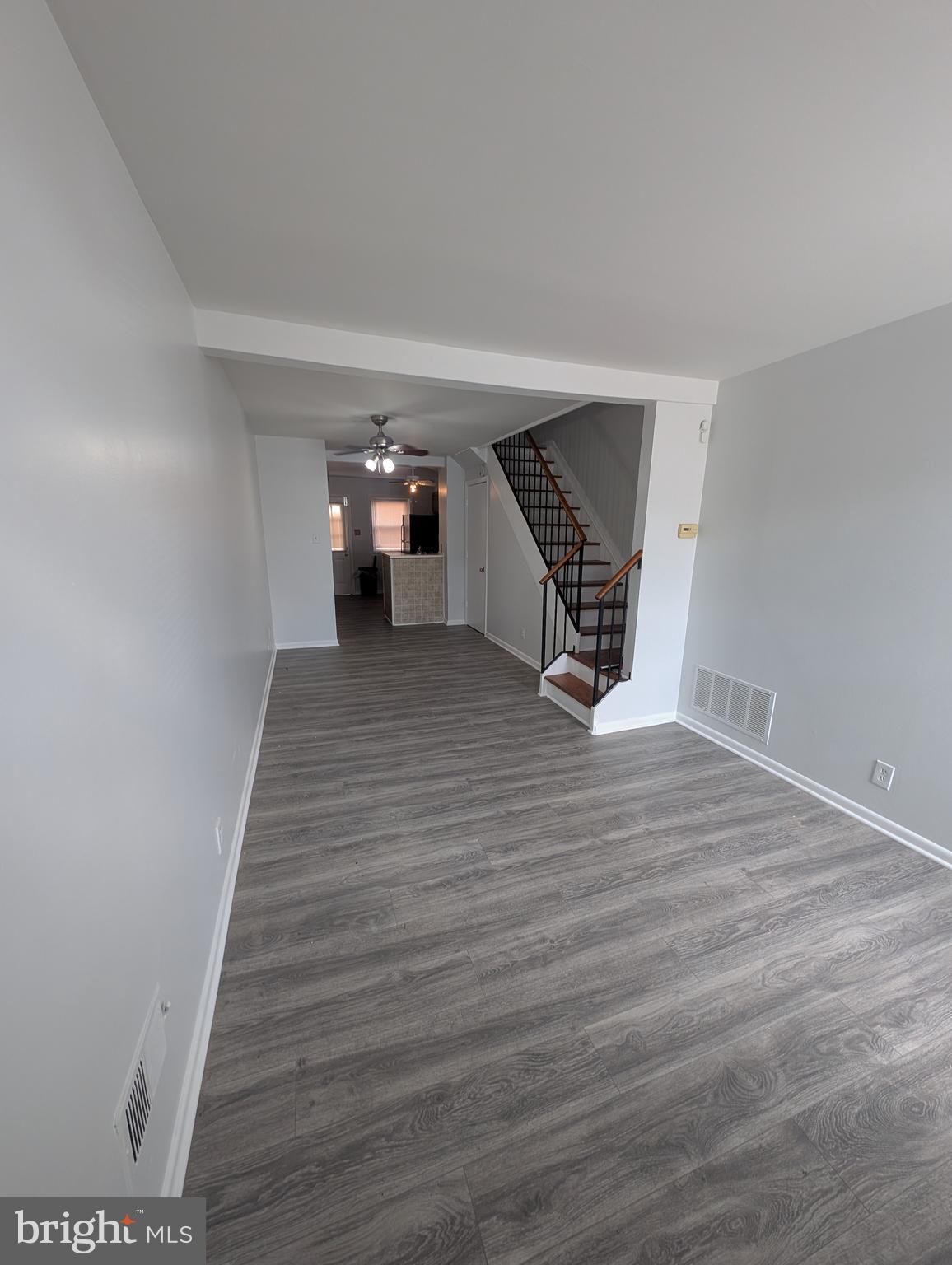 837 North Central Avenue Baltimore, MD 21202 - Photo 16 of 25 a view of a livingroom with wooden floor