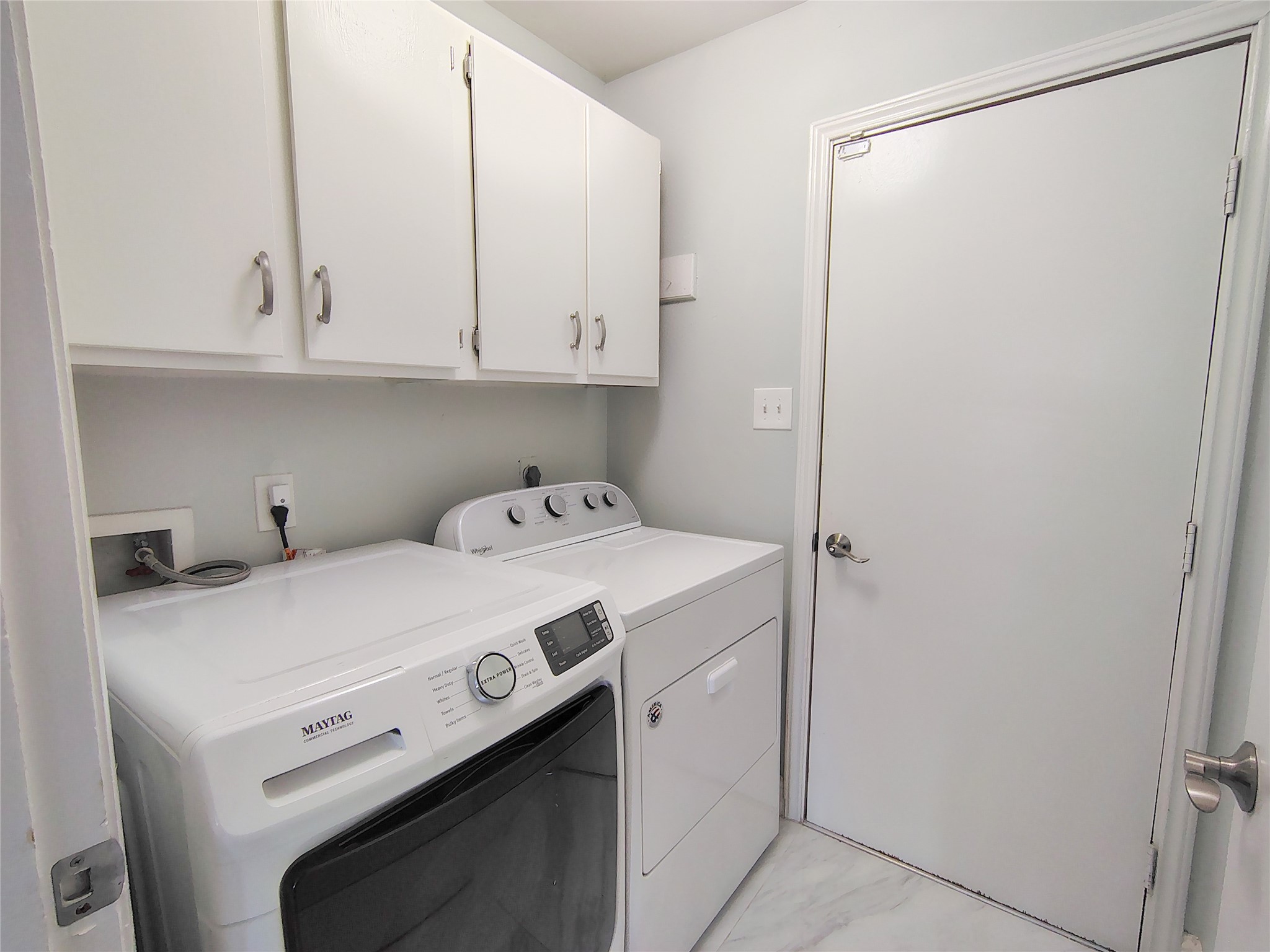 4411 Waterfall Way Sugar Land, TX 77479 - Photo 14 of 36 a utility room with dryer and washer