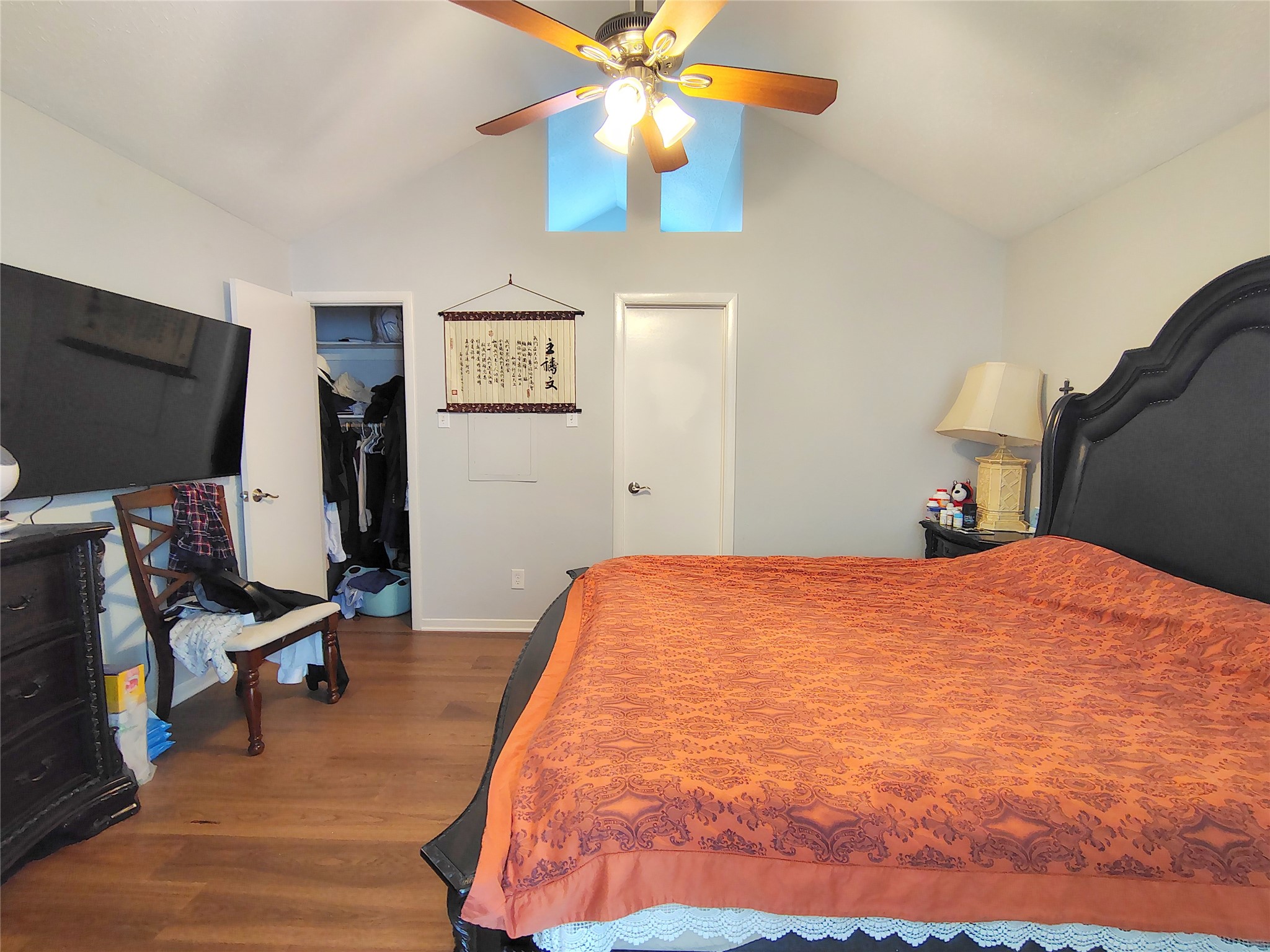 4411 Waterfall Way Sugar Land, TX 77479 - Photo 21 of 36 a bedroom with a bed and a chandelier