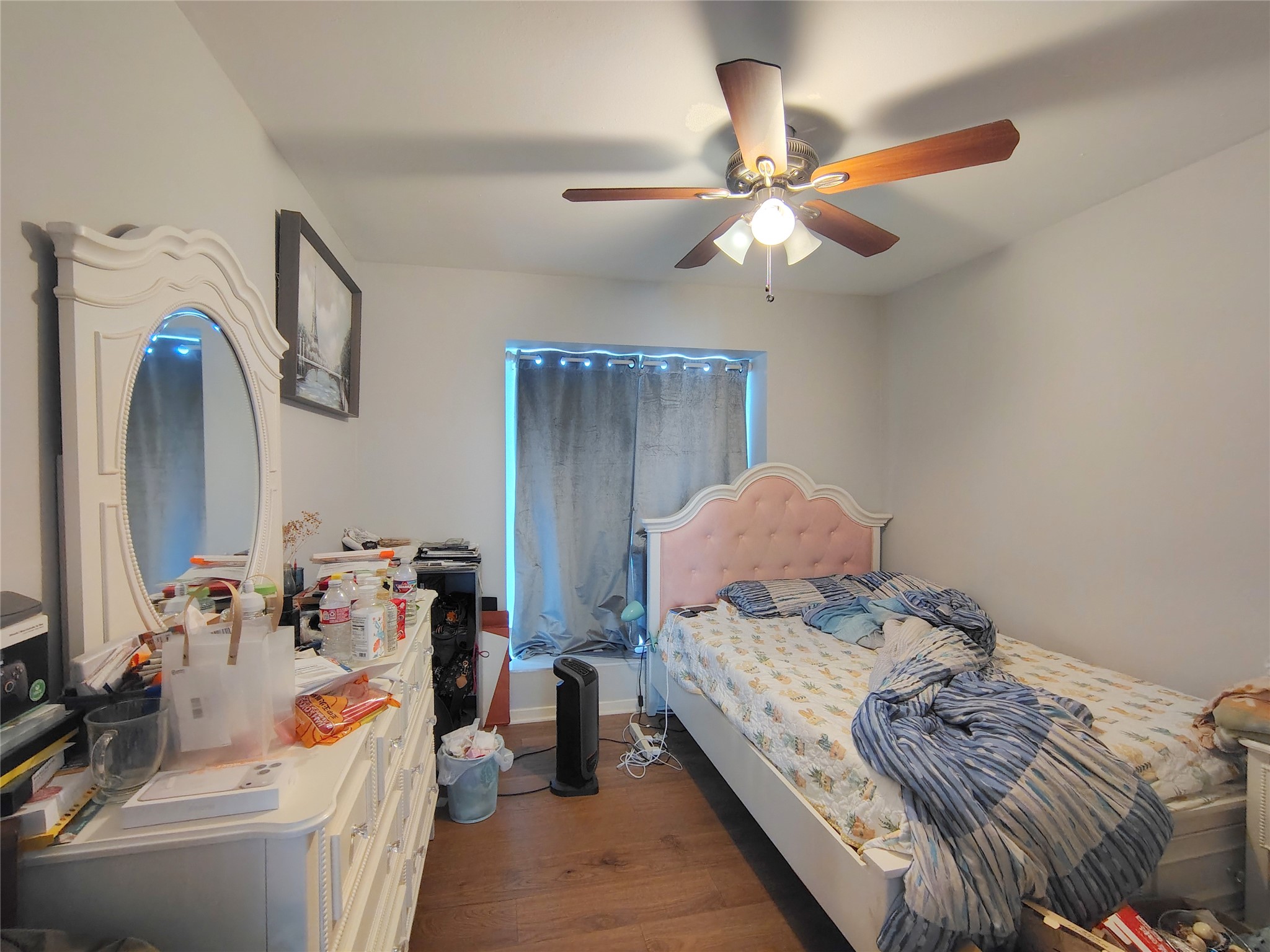 4411 Waterfall Way Sugar Land, TX 77479 - Photo 28 of 36 a bedroom with bed and a mirror