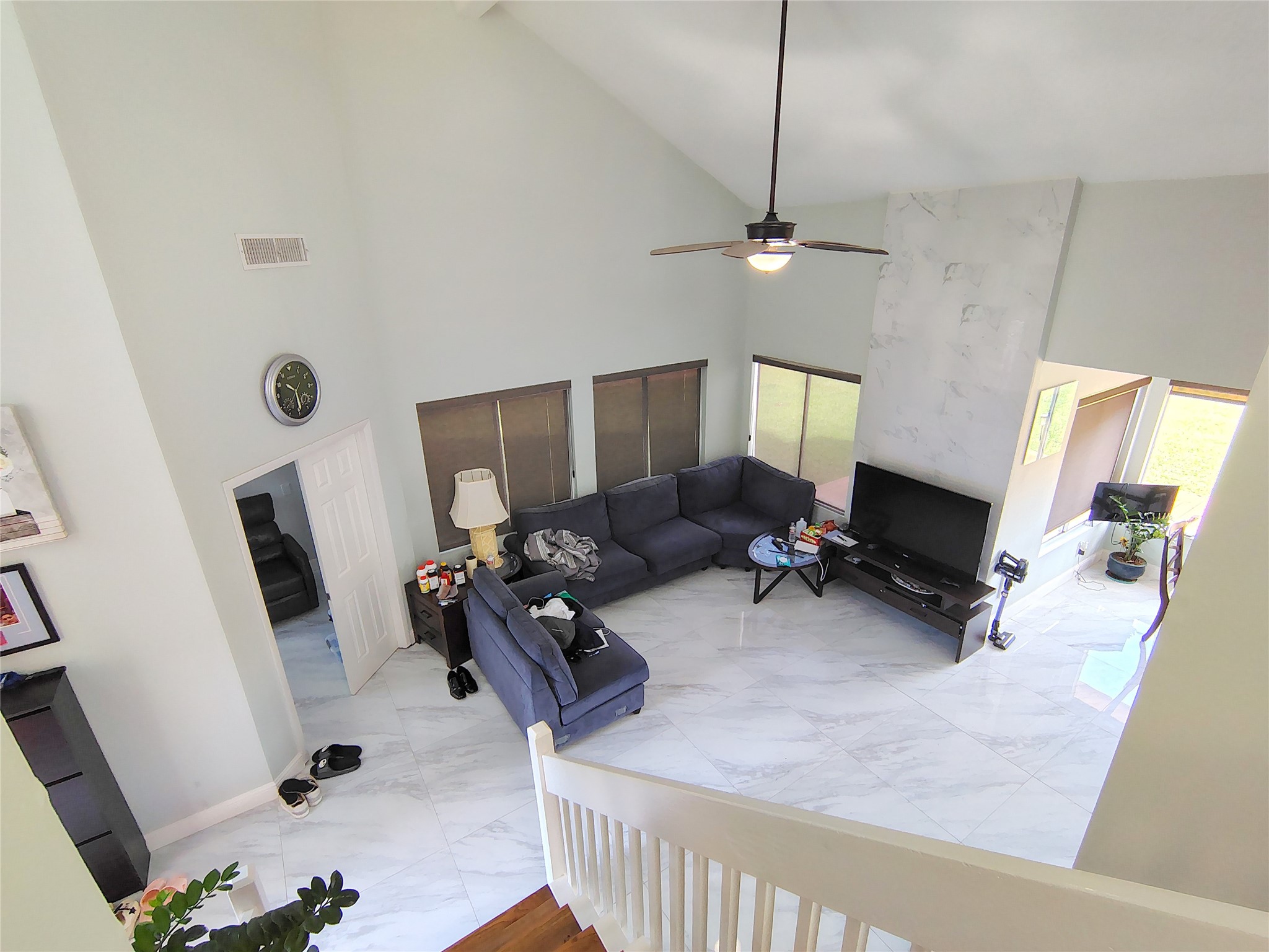 4411 Waterfall Way Sugar Land, TX 77479 - Photo 31 of 36 a living room with furniture and a flat screen tv