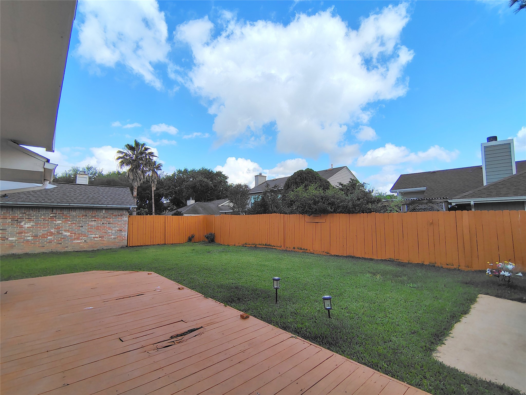 4411 Waterfall Way Sugar Land, TX 77479 - Photo 32 of 36 a view of a lake with a big yard