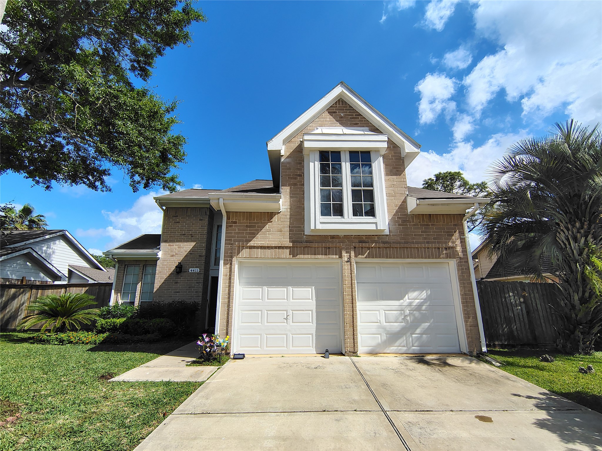 4411 Waterfall Way Sugar Land, TX 77479 - Photo 36 of 36 a front view of a house with a yard