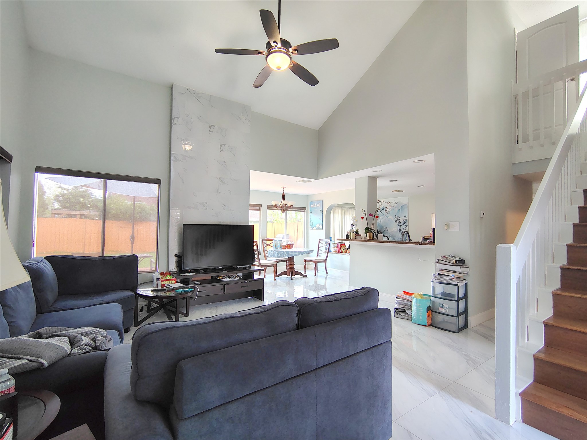 4411 Waterfall Way Sugar Land, TX 77479 - Photo 5 of 36 a living room with furniture and a flat screen tv