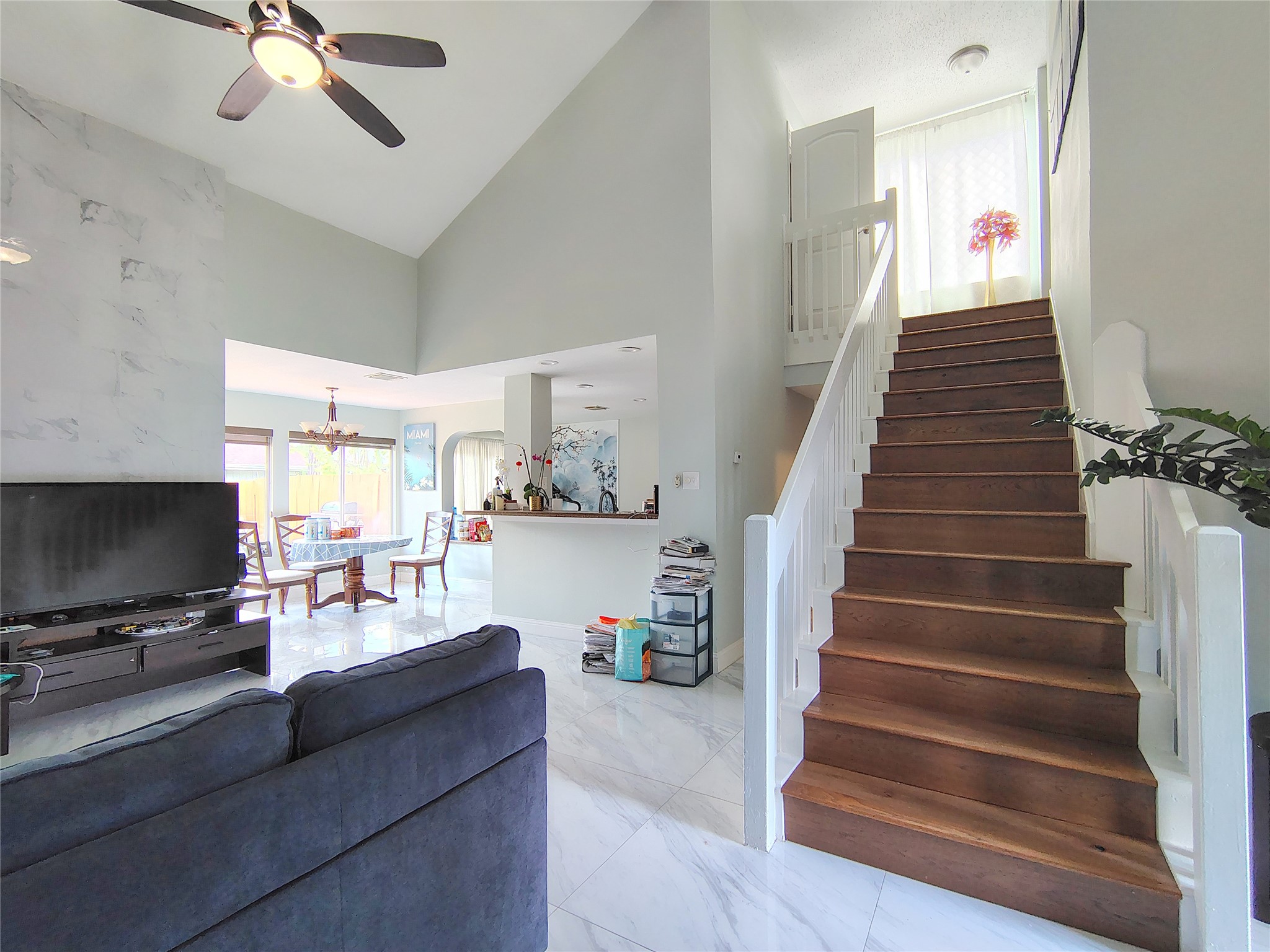 4411 Waterfall Way Sugar Land, TX 77479 - Photo 6 of 36 a living room with furniture and a flat screen tv