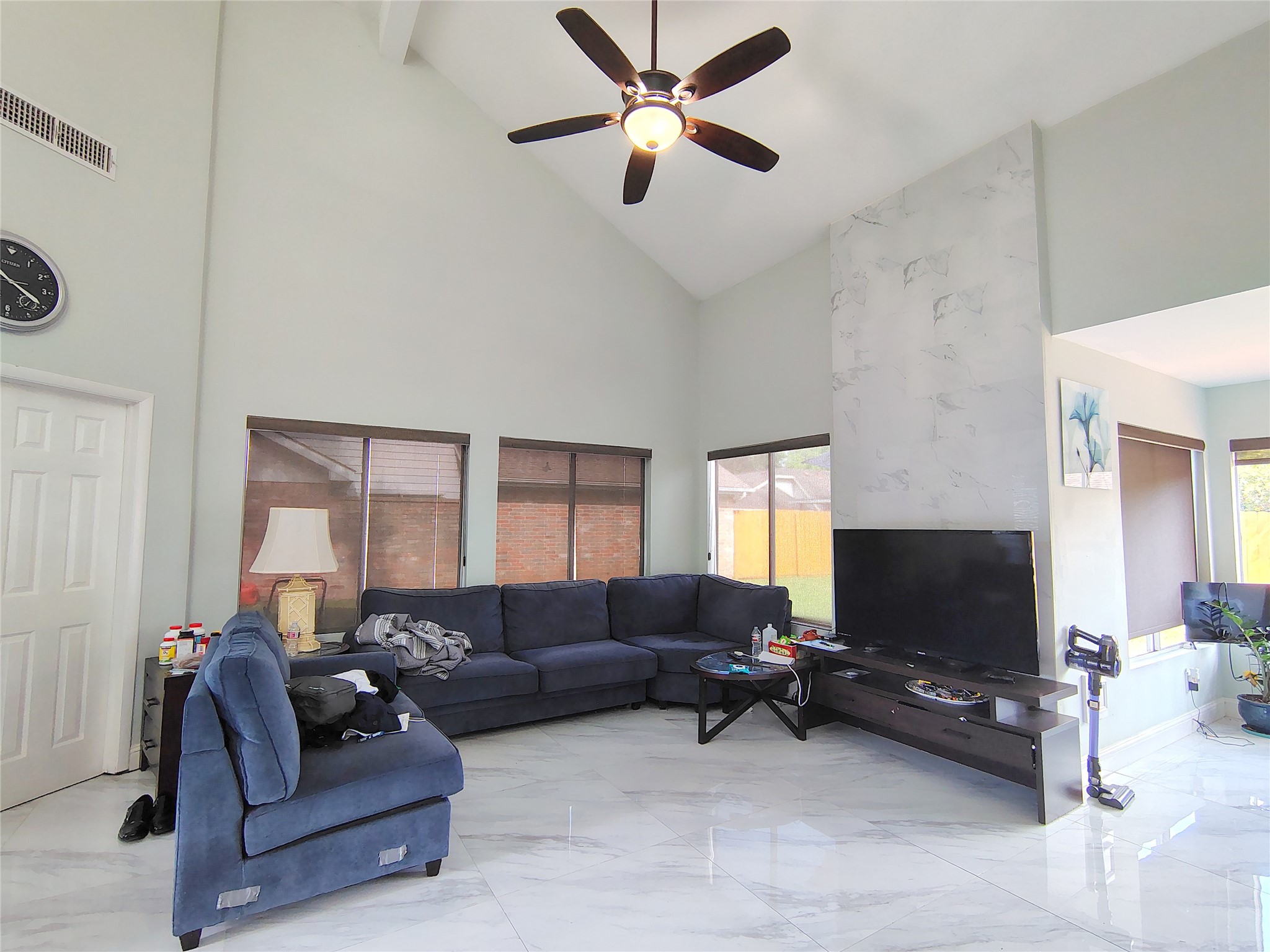 4411 Waterfall Way Sugar Land, TX 77479 - Photo 8 of 36 a living room with furniture and a flat screen tv