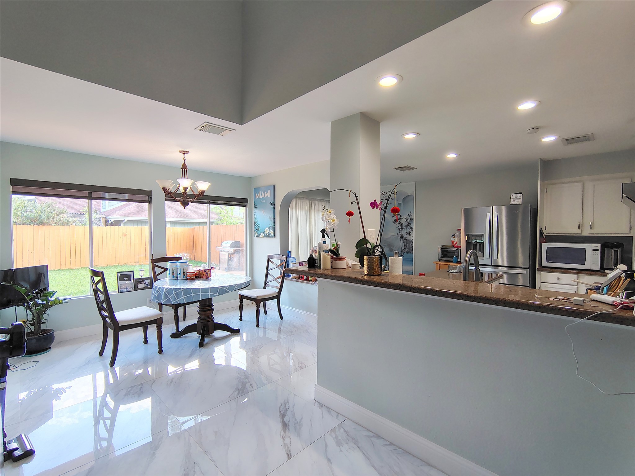 4411 Waterfall Way Sugar Land, TX 77479 - Photo 9 of 36 a view of a dining room with furniture and window