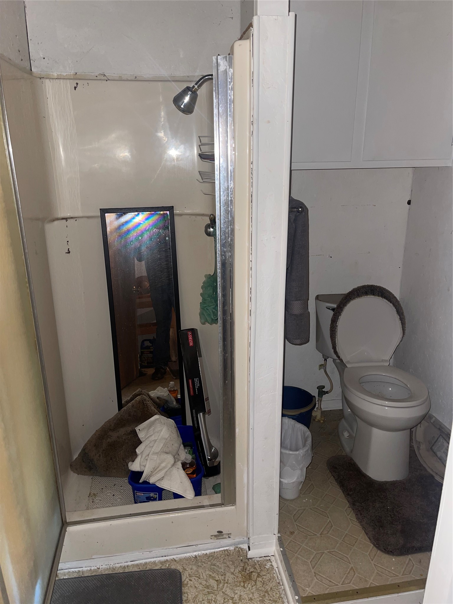 220 Ramp Way Trinity, TX 75862 - Photo 7 of 8 a bathroom with a toilet and a mirror
