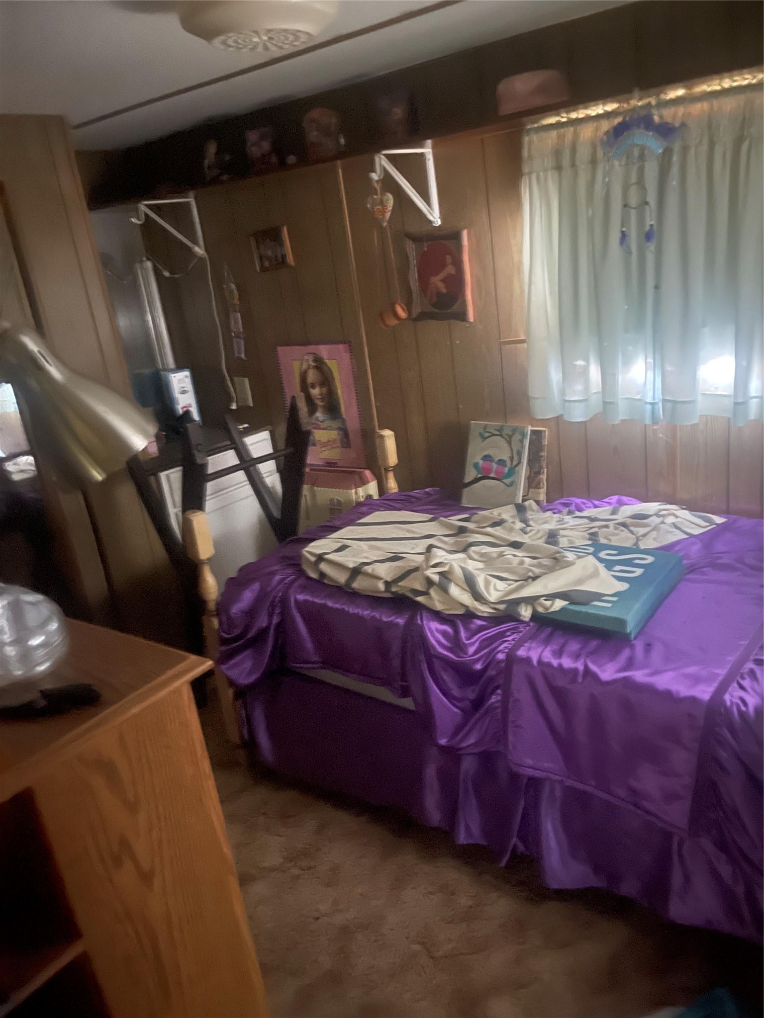 220 Ramp Way Trinity, TX 75862 - Photo 8 of 8 a bedroom with a bed and a mirror