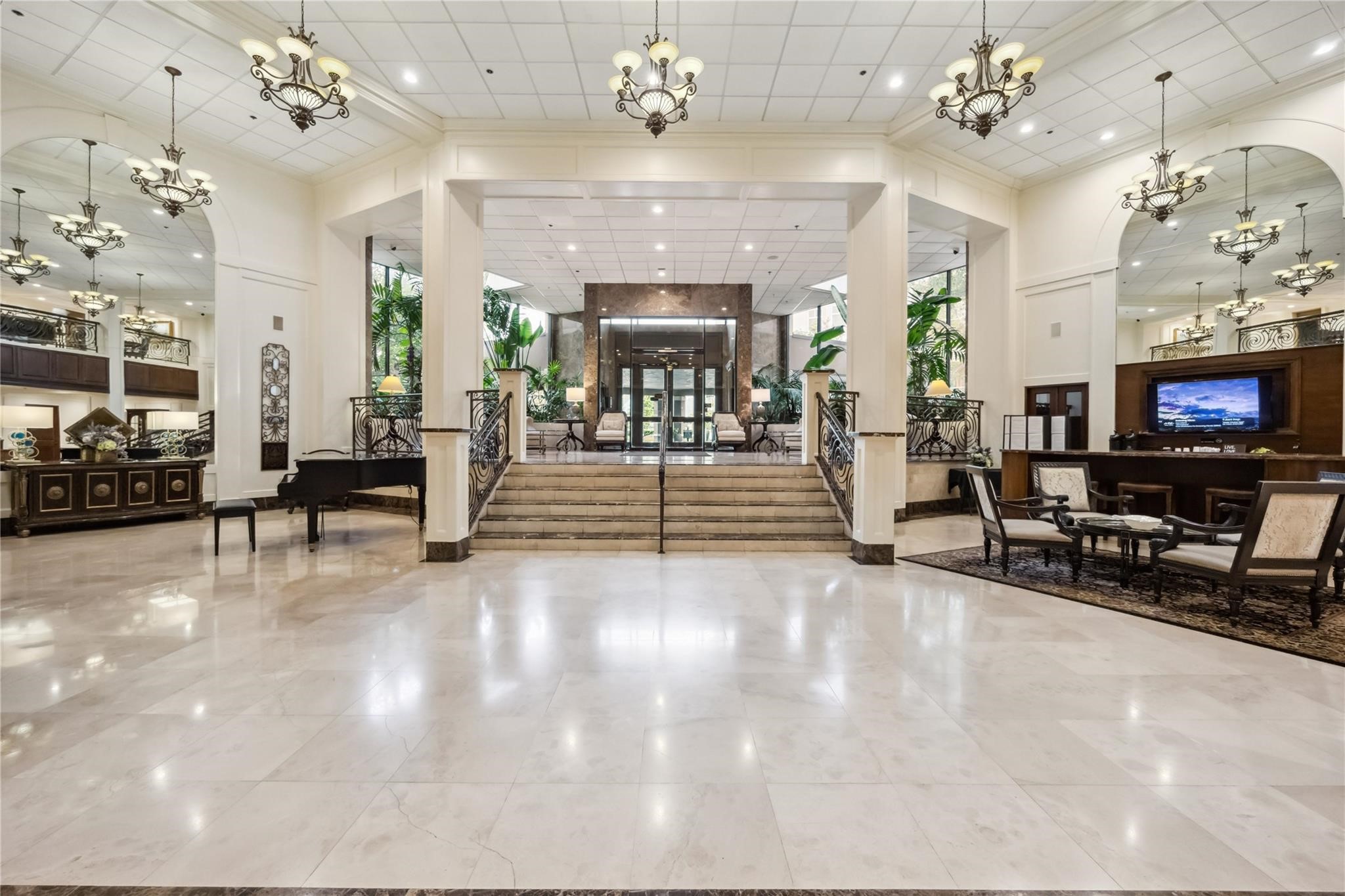 3525 Sage Road, Unit 1713 Houston, TX 77056 - Photo 2 of 25 Step into luxury—this grand lobby sets the tone for 3525 Sage’s upscale lifestyle. Enjoy 24-hour concierge service and beautifully renovated common spaces.