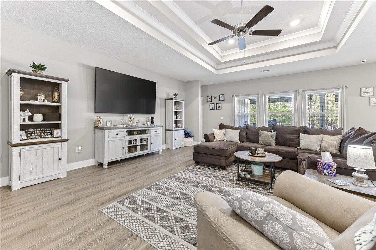 2455 Dakota Way Crestview, FL 32536 - Photo 22 of 81 a living room with furniture and a flat screen tv