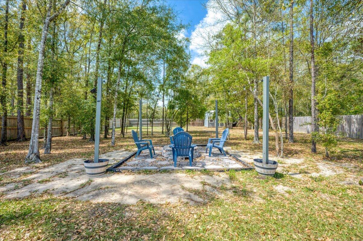 2455 Dakota Way Crestview, FL 32536 - Photo 66 of 81 a view of a park with bench and trees