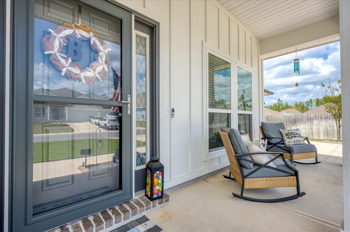 2455 Dakota Way Crestview, FL 32536 - Photo 7 of 81 a room with furniture and a large window