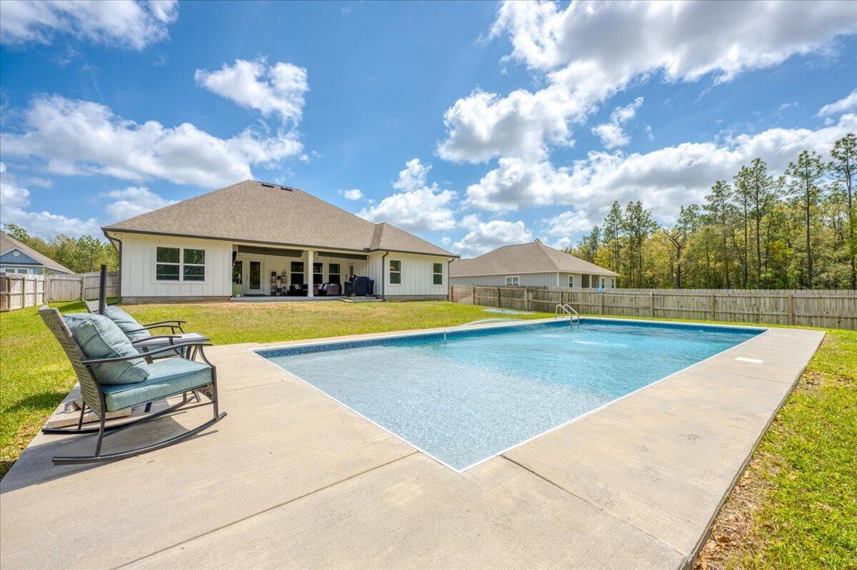 2455 Dakota Way Crestview, FL 32536 - Photo 72 of 81 a view of swimming pool with lounge chair
