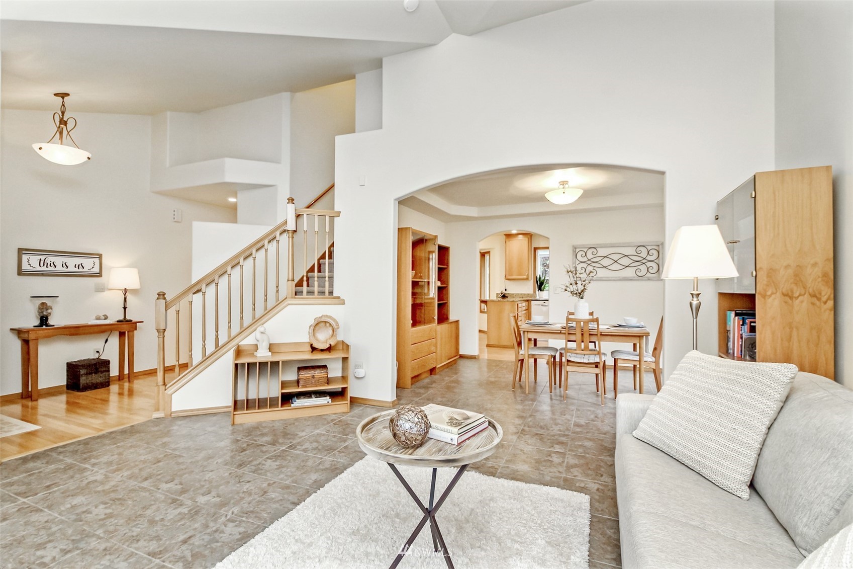 25815 176th Place Southeast Covington, WA 98042 - Photo 11 of 36 a living room with furniture and a table