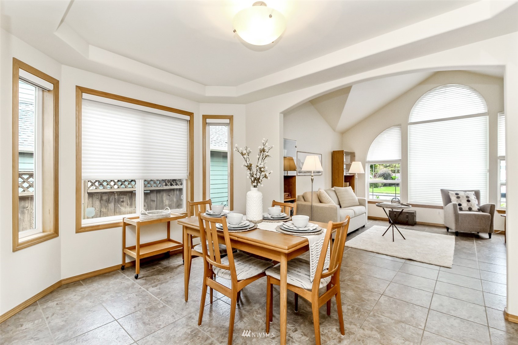 25815 176th Place Southeast Covington, WA 98042 - Photo 12 of 36 a dining room with furniture and large windows