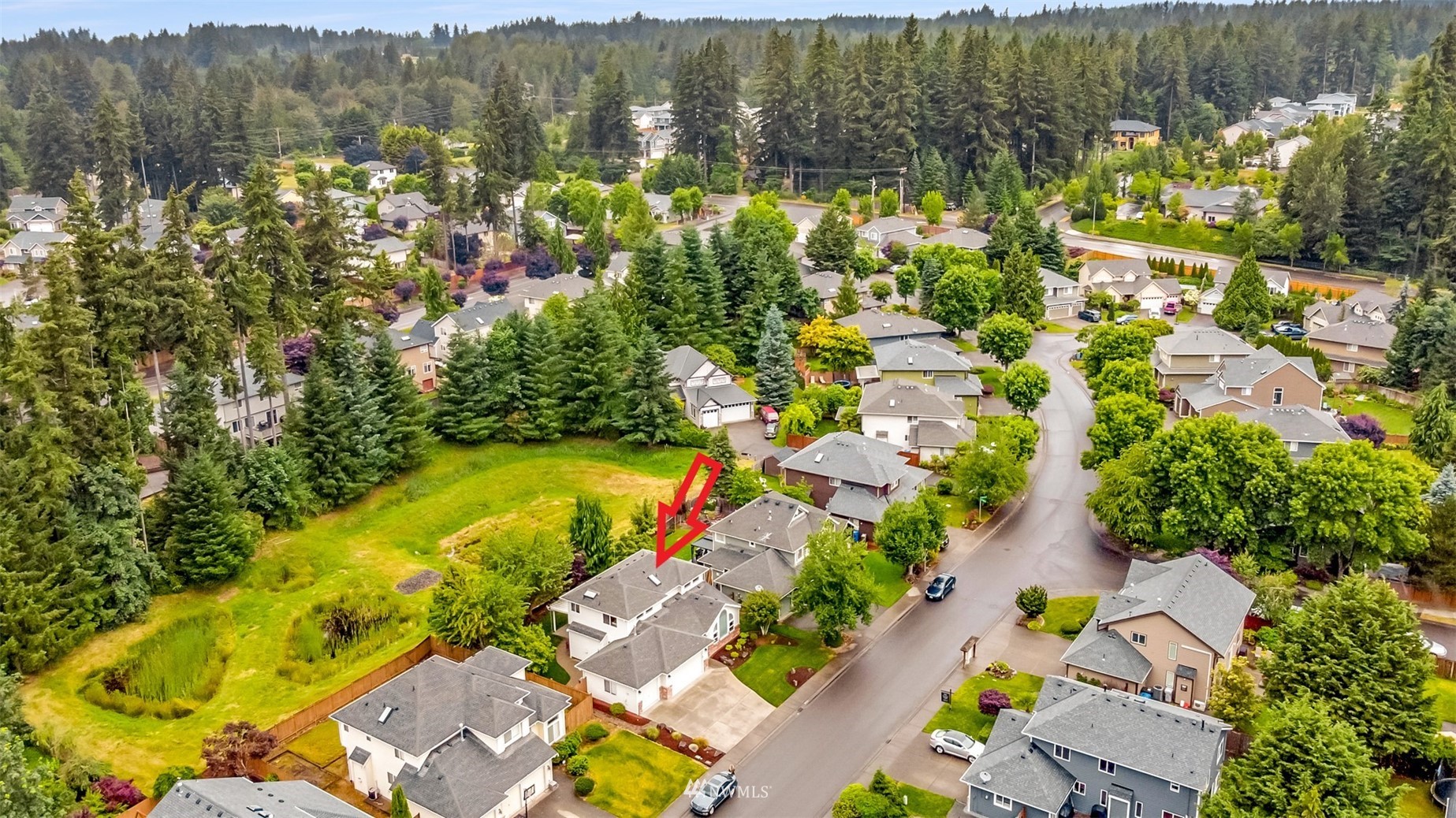 25815 176th Place Southeast Covington, WA 98042 - Photo 2 of 36 an aerial view of residential houses with outdoor space and swimming pool