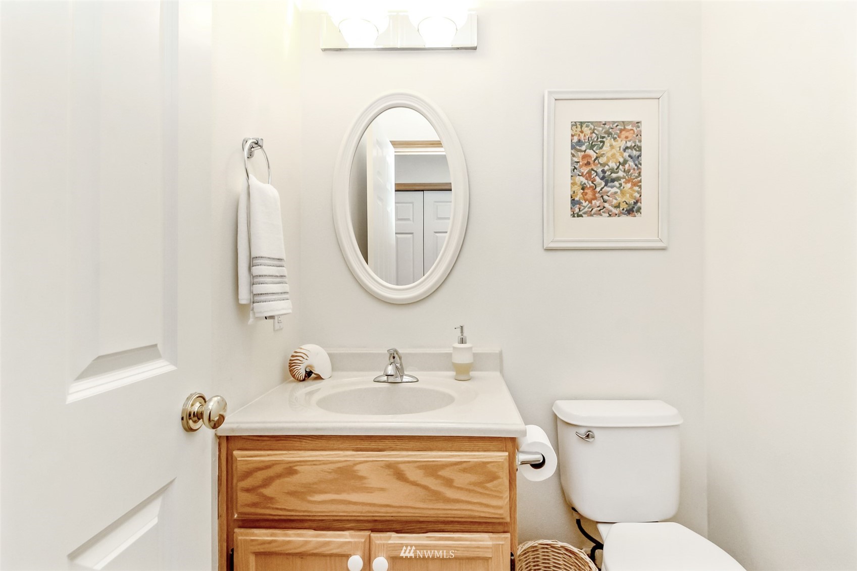 25815 176th Place Southeast Covington, WA 98042 - Photo 21 of 36 a bathroom with a toilet sink and mirror