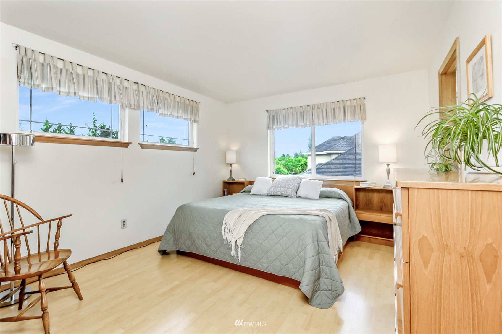 25815 176th Place Southeast Covington, WA 98042 - Photo 23 of 36 a bedroom with a bed window and wall painting
