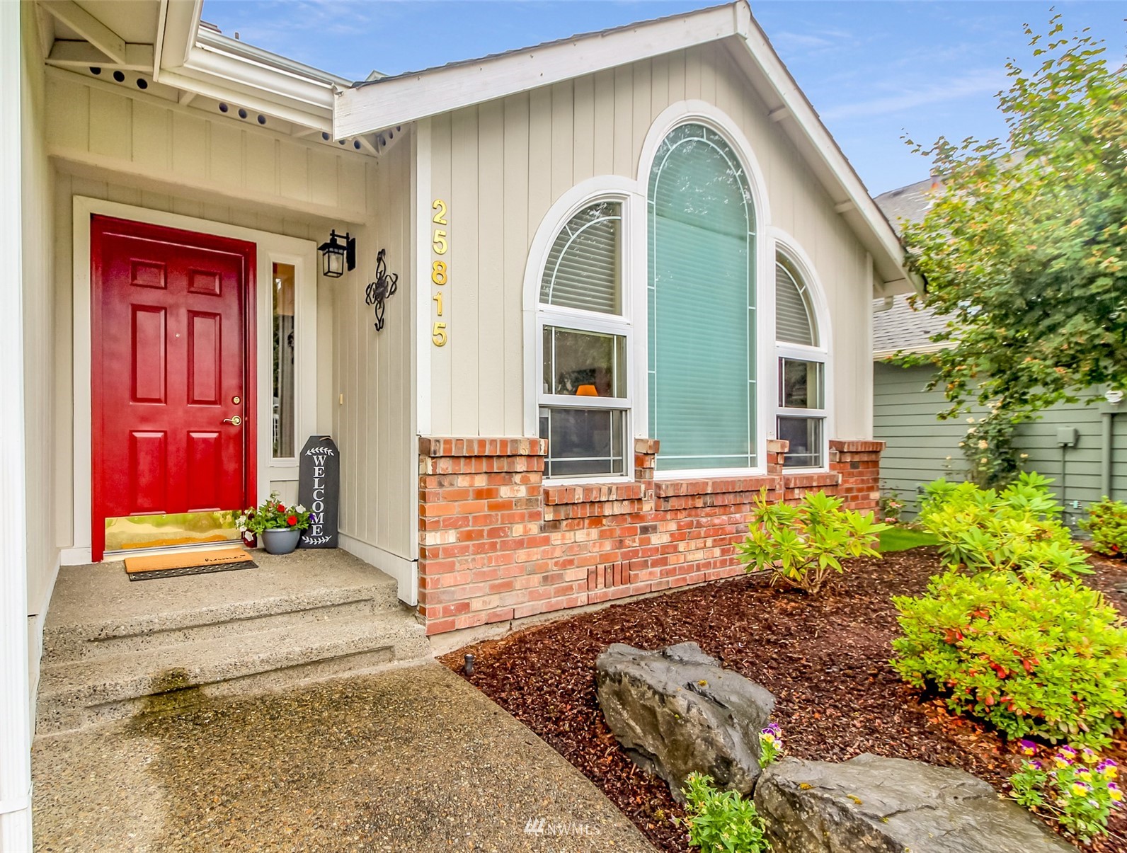 25815 176th Place Southeast Covington, WA 98042 - Photo 7 of 36 a front view of a house with garden